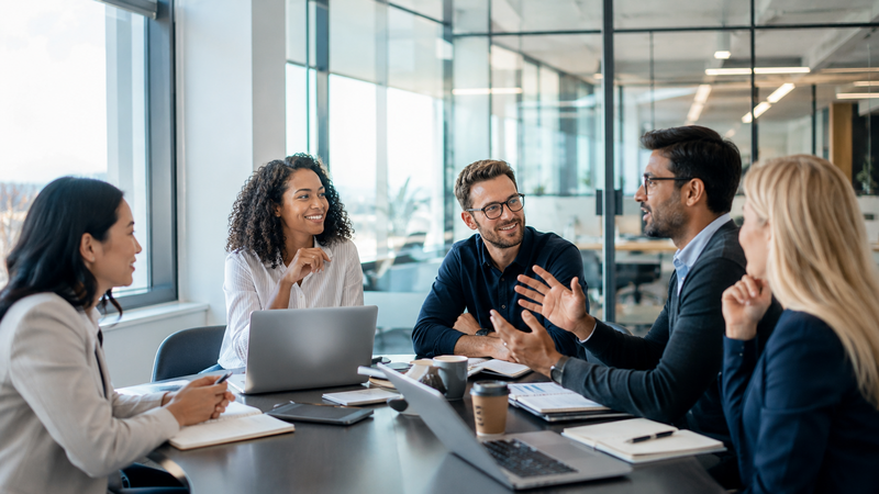 International colleagues collaborating in a modern office